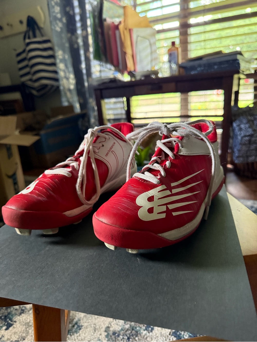 New Balance Men’s size 5 Red and White Baseball Cleats - youth/teen